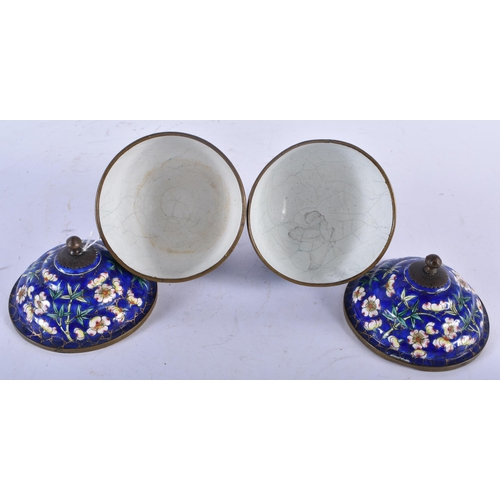 728 - A PAIR OF 19TH CENTURY CHINESE CANTON ENAMEL TEABOWLS ON STANDS Qing. 14cm x 10 cm.