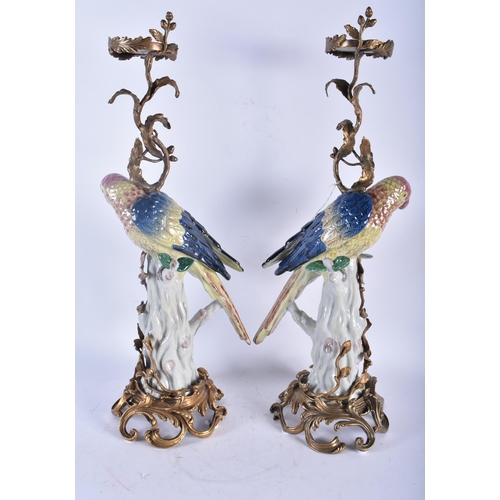 730 - A LARGE PAIR OF CONTINENTAL PORCELAIN ORMOLU AND BRONZE PARROT CANDLESTICKS. 56 cm high.