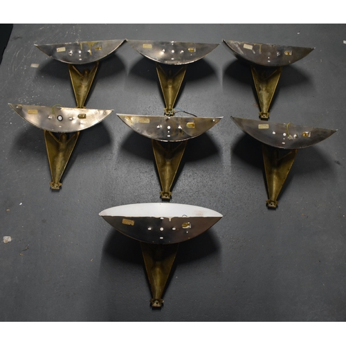 737 - A SET OF SEVEN ART DECO STYLE BRASS AND CHROME UPLIGHTERS formed as winged females. 34 cm x 38 cm. (... 