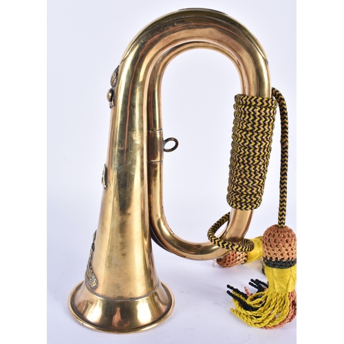 746 - A MILITARY RA 83347 BRASS BUGLE stamped F Parry. 28 cm x 13 cm.