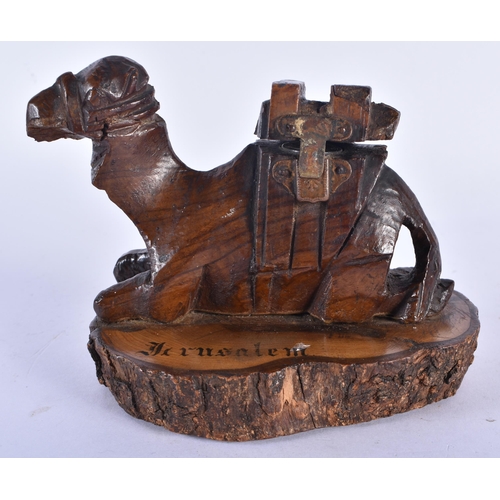 753 - A MIDDLE EASTERN JERUSALEM CARVED WOOD CAMEL INKWELL together with a treen shoe & assorted antique J... 