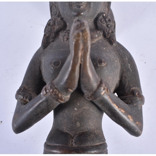 754 - AN 18TH/19TH CENTURY MIDDLE EASTERN BRONZE FIGURAL DOOR HANDLE formed as a female deity. 21 cm long.