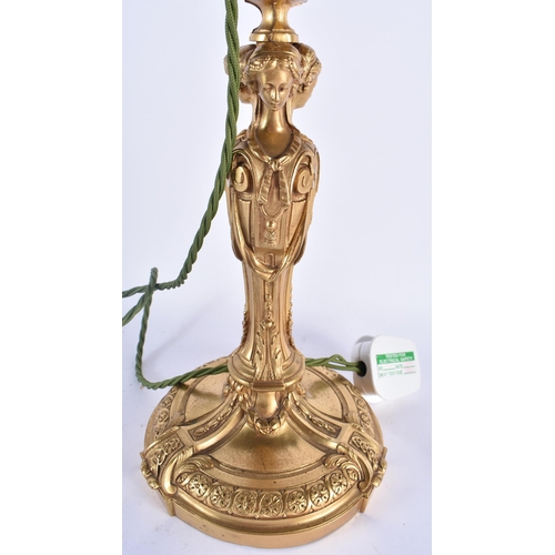 763 - A LARGE 19TH CENTURY FRENCH ORMOLU TRIPLE FIGURAL COUNTRY HOUSE LAMP upon a base decorated with foli... 