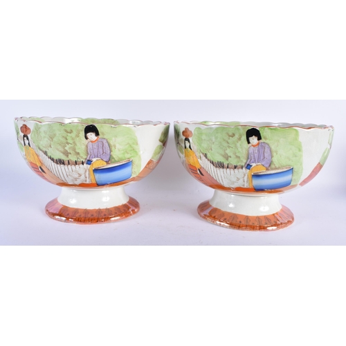 766 - AN UNUSUAL PAIR OF 19TH CENTURY POTTERY ORANGE LUSTRE BOWLS printed and painted with possible South ... 