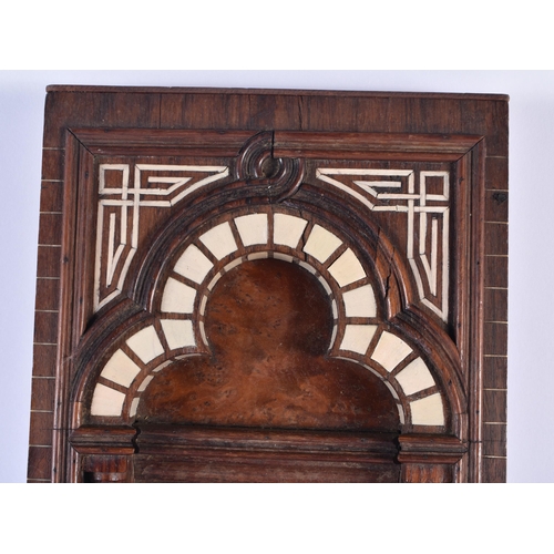 767 - A 19TH CENTURY CONTINENTAL CARVED HARDWOOD ARCHITECTURAL PANEL depicting an Islamic doorway. 52 cm x... 