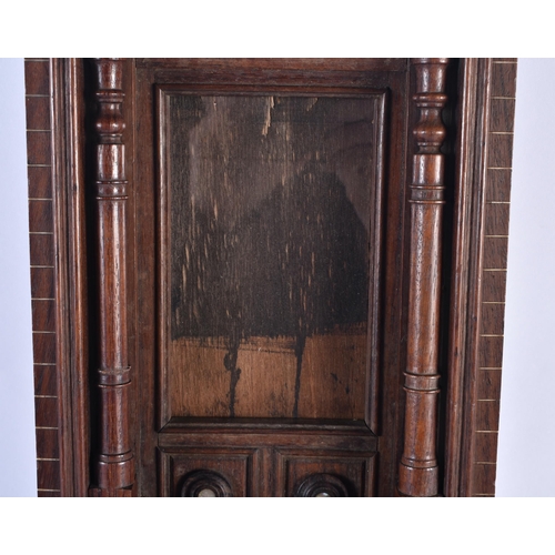 767 - A 19TH CENTURY CONTINENTAL CARVED HARDWOOD ARCHITECTURAL PANEL depicting an Islamic doorway. 52 cm x... 