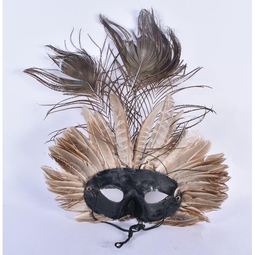 769 - A VINTAGE PEACOCK FEATHER VENETIAN STYLE THEATRICAL MASK. 34 cm x 27 cm.