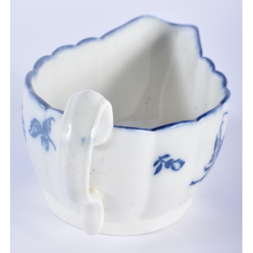 77 - AN 18TH CENTURY CAUGHLEY BLUE AND WHITE PORCELAIN SAUCE BOAT decorated with fruiting vines upon a ri... 