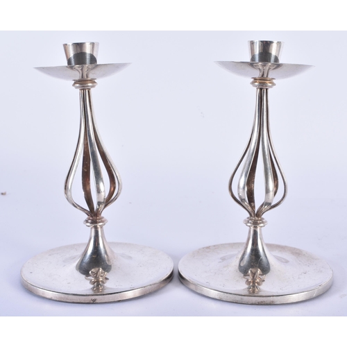 770 - A STYLISH PAIR OF ART NOUVEAU SILVER PLATED CANDLESTICKS. 15 cm high.