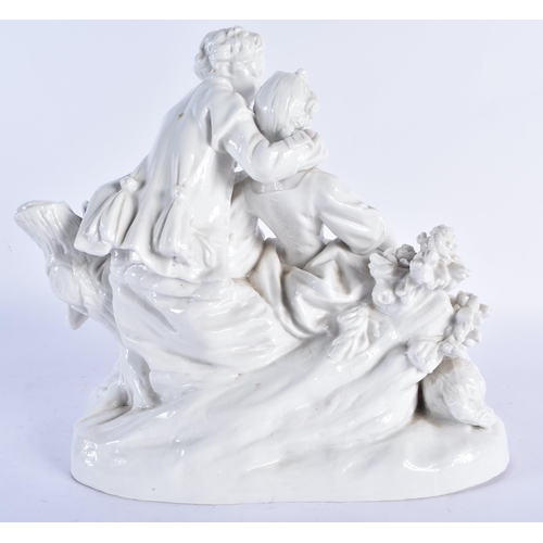 773 - A LARGE ANTIQUE NAPLES BLANC DE CHINE PORCELAIN FIGURAL GROUP modelled as two lovers beside a pair o... 