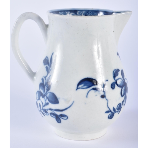 78 - AN 18TH CENTURY WORCESTER BLUE AND WHITE PORCELAIN SPARROW BEAK JUG painted with floral sprays. 9 cm... 