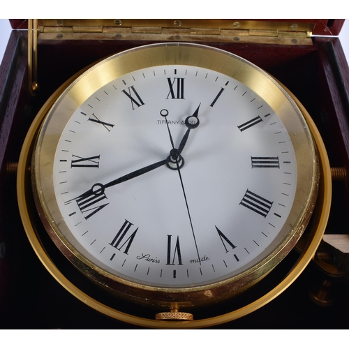 808 - A TIFFANY & CO MARINE CHRONOMETER STYLE MAHOGANY DESK CLOCK. 18cm x 18cm.