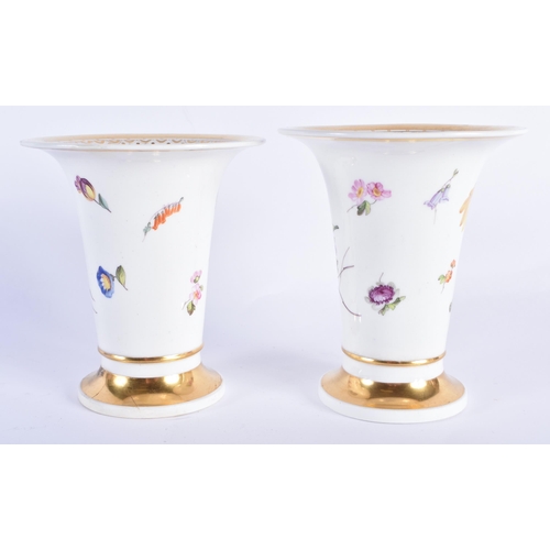 812 - A PAIR OF EARLY 19TH CENTURY DERBY PORCELAIN VASES painted with flowers. 13 cm x 9 cm.