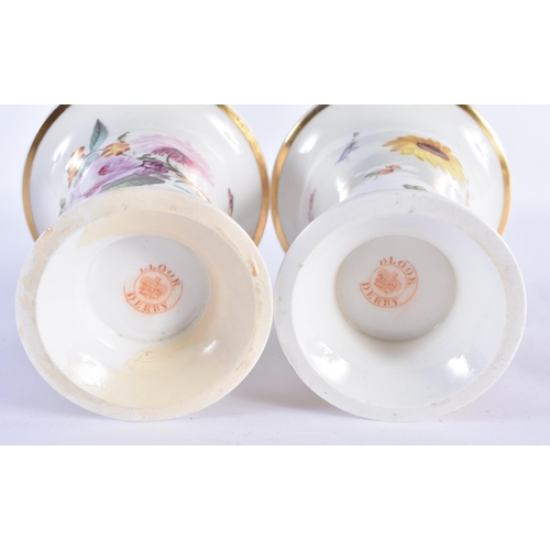 812 - A PAIR OF EARLY 19TH CENTURY DERBY PORCELAIN VASES painted with flowers. 13 cm x 9 cm.