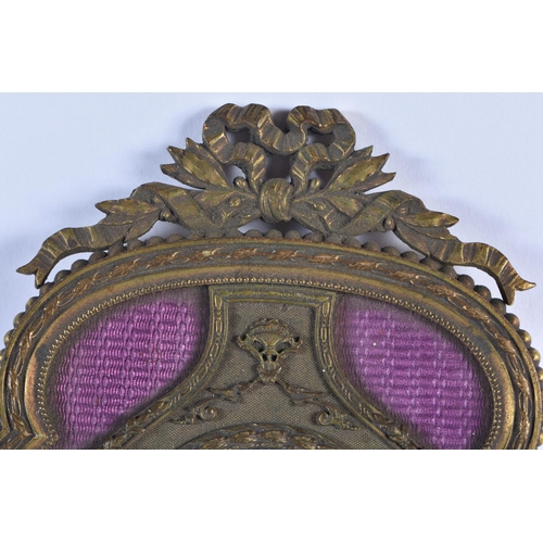 815 - AN ANTIQUE FRENCH BRONZE AND PURPLE ENAMEL HAND MIRROR. 27 cm long.