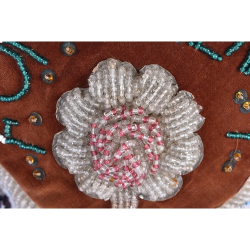 829 - A VICTORIAN BEADWORK CUSHION. 27 cm x 24 cm.