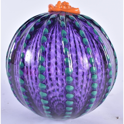 852 - AN UNUSUAL ART GLASS BALL. 14 cm x 10 cm.