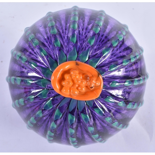 852 - AN UNUSUAL ART GLASS BALL. 14 cm x 10 cm.