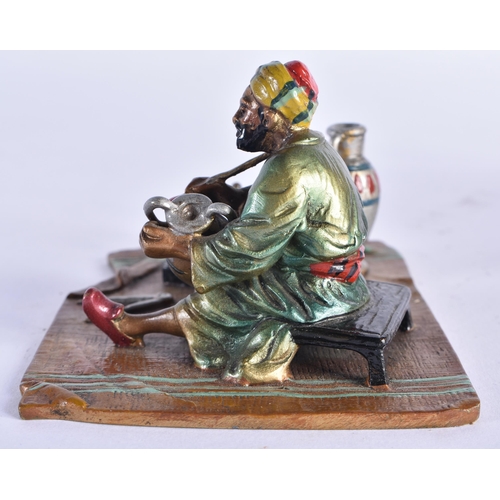 854 - AN AUSTRIAN COLD PAINTED BRONZE FIGURE OF A TURKISH TRADESMAN. 10 cm x 8 cm.