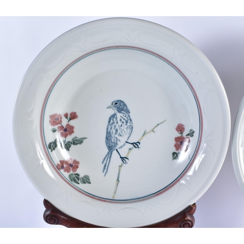 858 - A LARGE PAIR OF CHINESE PORCELAIN PLATES upon a fitted hardwood base. 52 cm x 25cm.