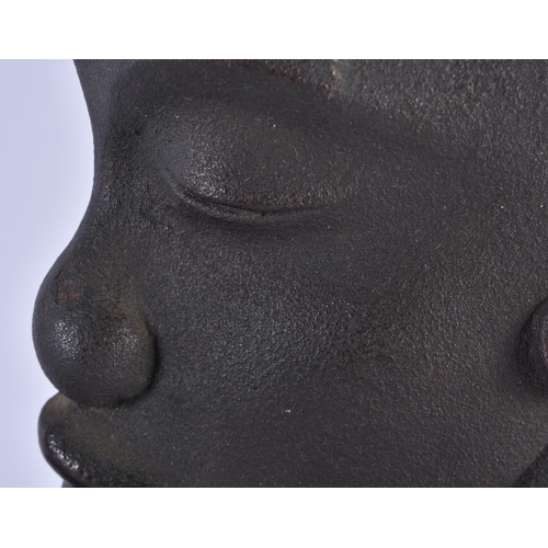 873 - A VINTAGE CAST IRON BUST OF AN AFRICAN FEMALE in the manner of Hagenauer. 36 cm x 20 cm.