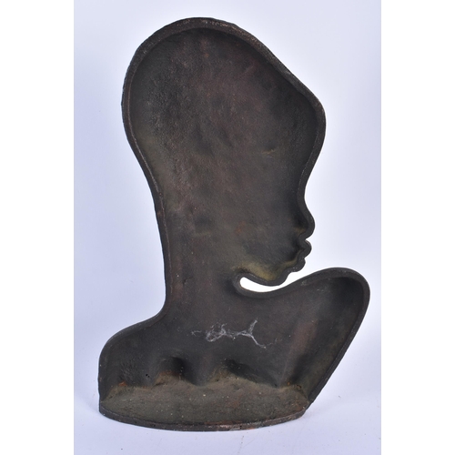 873 - A VINTAGE CAST IRON BUST OF AN AFRICAN FEMALE in the manner of Hagenauer. 36 cm x 20 cm.