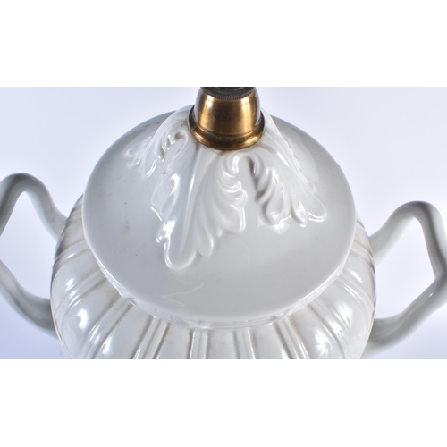 878 - A LARGE CONTINENTAL TWIN HANDLED WHITE PORCELAIN VASE LAMP. 68 cm high.