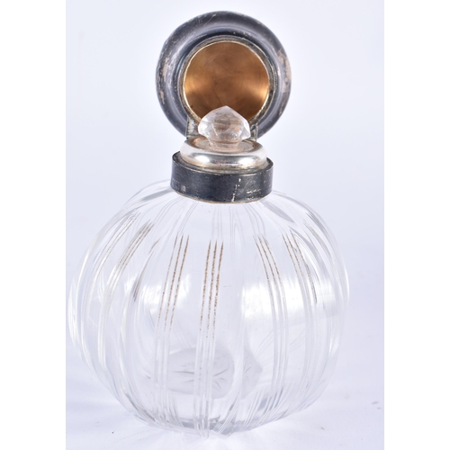 879 - AN ANTIQUE SILVER MOUNTED CUT GLASS SCENT BOTTLE together with a small crystal glass jewellery box. ... 