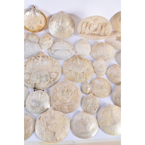 891 - A VERY LARGE COLLECTION OF 19TH CENTURY CONTINENTAL CARVED MOTHER OF PEARL SHELLS in various forms a... 