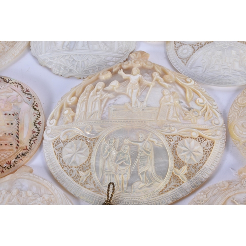 891 - A VERY LARGE COLLECTION OF 19TH CENTURY CONTINENTAL CARVED MOTHER OF PEARL SHELLS in various forms a... 