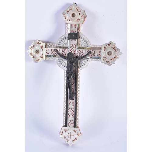 893 - AN ANTIQUE MOTHER OF PEARL AND ABALONE SHELL CORPUS CHRISTI CRUCIFIX. 32 cm x 16 cm.