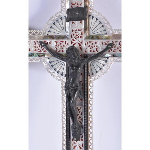 893 - AN ANTIQUE MOTHER OF PEARL AND ABALONE SHELL CORPUS CHRISTI CRUCIFIX. 32 cm x 16 cm.