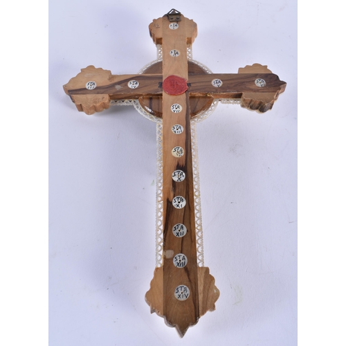 893 - AN ANTIQUE MOTHER OF PEARL AND ABALONE SHELL CORPUS CHRISTI CRUCIFIX. 32 cm x 16 cm.