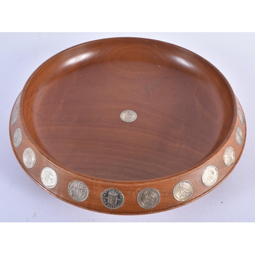 894 - A SCOTTISH DUNDEE SILVER AND TURNED WOOD COIN BOWL. 30cm diameter.