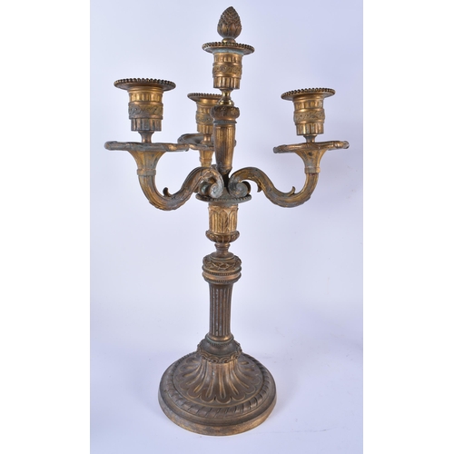 895 - A LARGE PAIR OF 19TH CENTURY FRENCH BRONZE TRIPLE BRANCH CANDELABRA formed with scrolling arms. 45cm... 