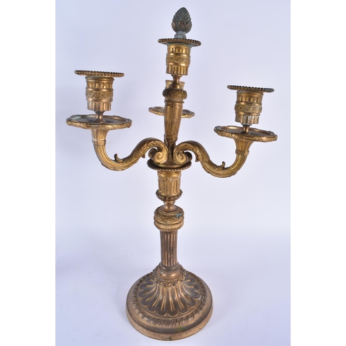 895 - A LARGE PAIR OF 19TH CENTURY FRENCH BRONZE TRIPLE BRANCH CANDELABRA formed with scrolling arms. 45cm... 