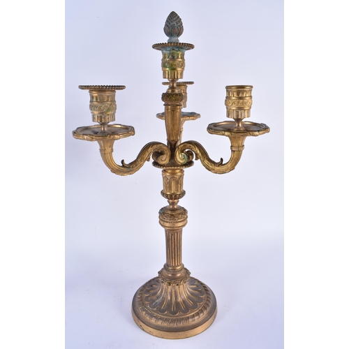 895 - A LARGE PAIR OF 19TH CENTURY FRENCH BRONZE TRIPLE BRANCH CANDELABRA formed with scrolling arms. 45cm... 