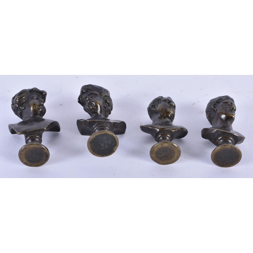 898 - A SET OF FOUR 19TH CENTURY EUROPEAN GRAND TOUR BRONZE BUSTS of small form. 5.5 cm high. (4)