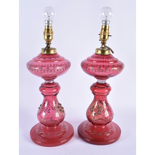 904 - A Pair of Cranberry Glass Oil Lamp Bases converted to Electric Lights.  40cm to top of fitting, 15cm... 