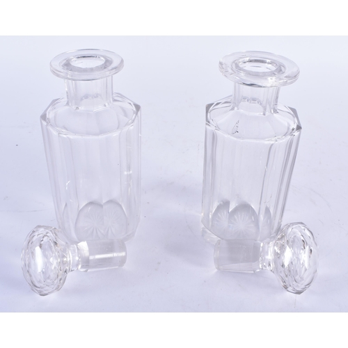 905 - A Pair of Cut Glass Decanters.  18cm x 6.5cm,