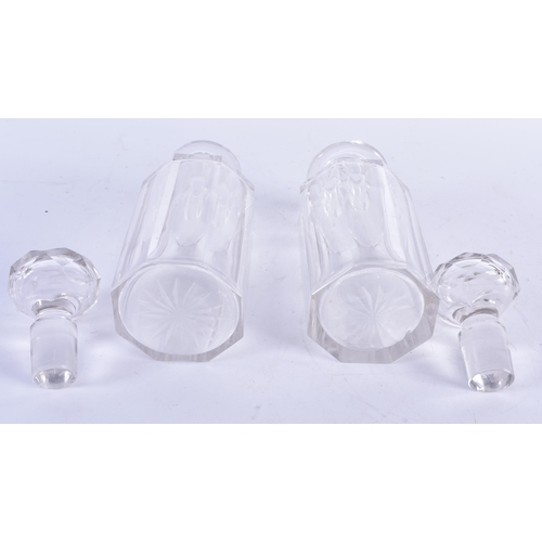 905 - A Pair of Cut Glass Decanters.  18cm x 6.5cm,