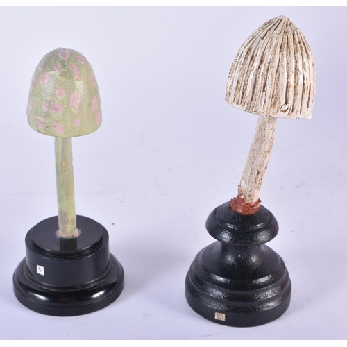 916 - TWO UNUSUAL CARVED FOLK ART PAINTED WOOD MUSHROOM SPECIMENs. 12cm high.(2)