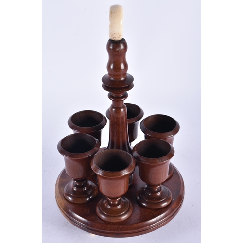 934 - Antique Georgian Victorian Treen Turned Wood Fruitwood Egg Cup Set on Stand with Bone Finial and Fee... 