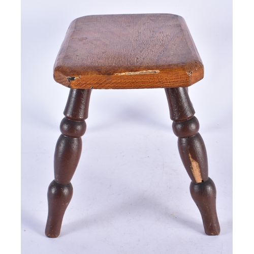 942 - An Milking Stool with Turned Legs with Scumball Effect.  22cm x 26cm x 22cm