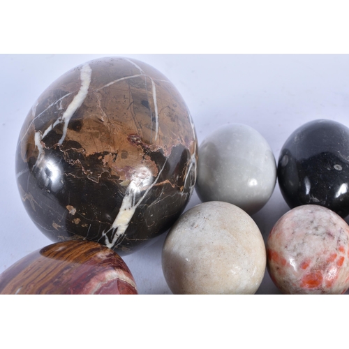 944 - A Collection of Hardstone Eggs in an associated Box.  Largest 14.5cm x 9cm (27)