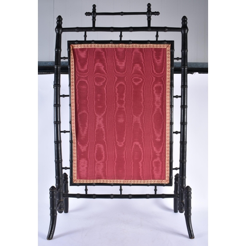 953 - A Japanese Bamboo Screen with an Embroidered Panel.  103cm x 60cm x 33cm