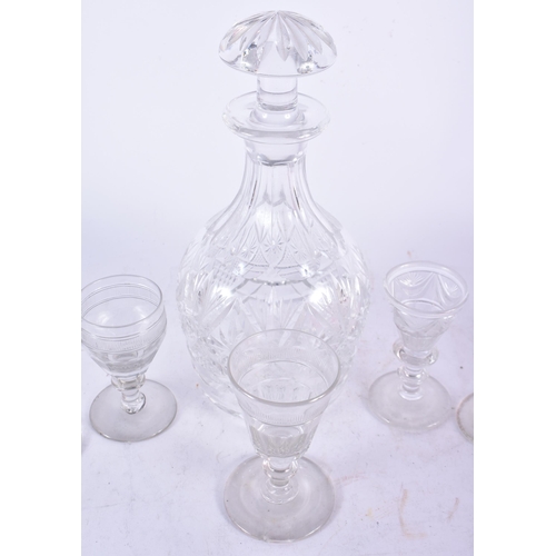 966 - A Cut Glass Decanter with Five assorted Glasses.  Decanter 25cm x 11cm (6)