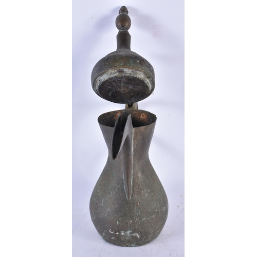 968 - An Antique Arabic Middle Eastern Islamic Bedouin Dallah Coffee Pot.  40cm x 34cm x 14cm