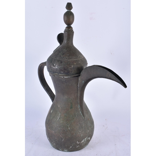 968 - An Antique Arabic Middle Eastern Islamic Bedouin Dallah Coffee Pot.  40cm x 34cm x 14cm