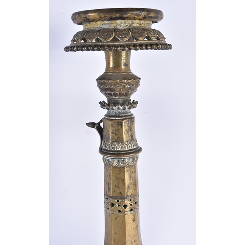 969 - Two Antique Arabic Middle Eastern Islamic Bedouin Candlesticks.  Largest 52cm x 21.5cm